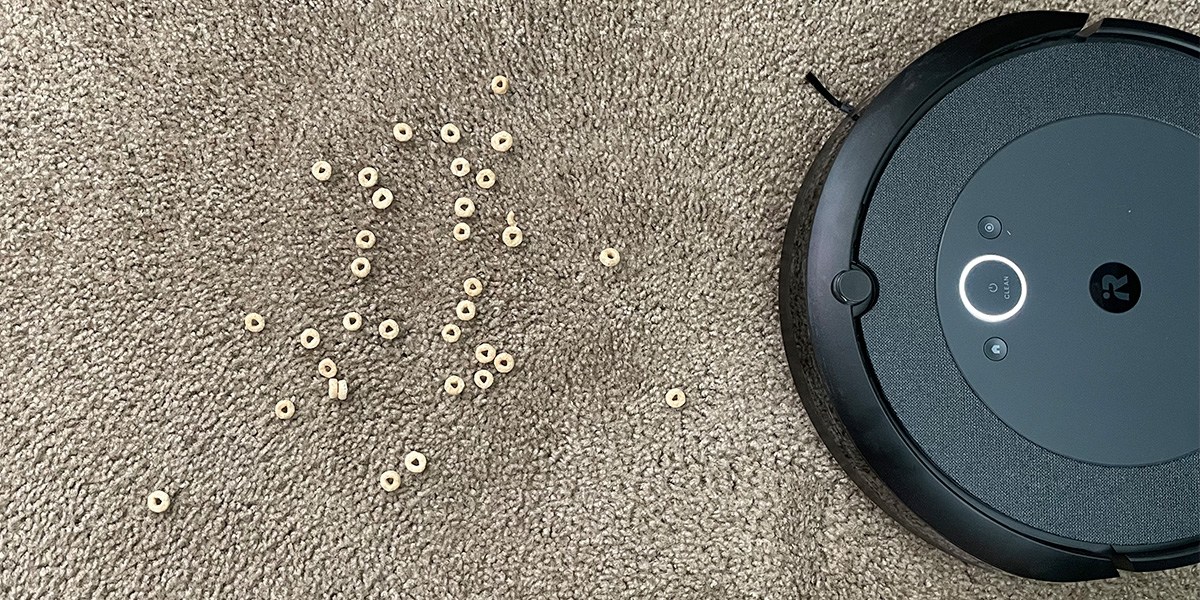 Roomba i4 EVO vacuuming cereal on carpet Roomba i4 EVO vacuuming cereal on carpet