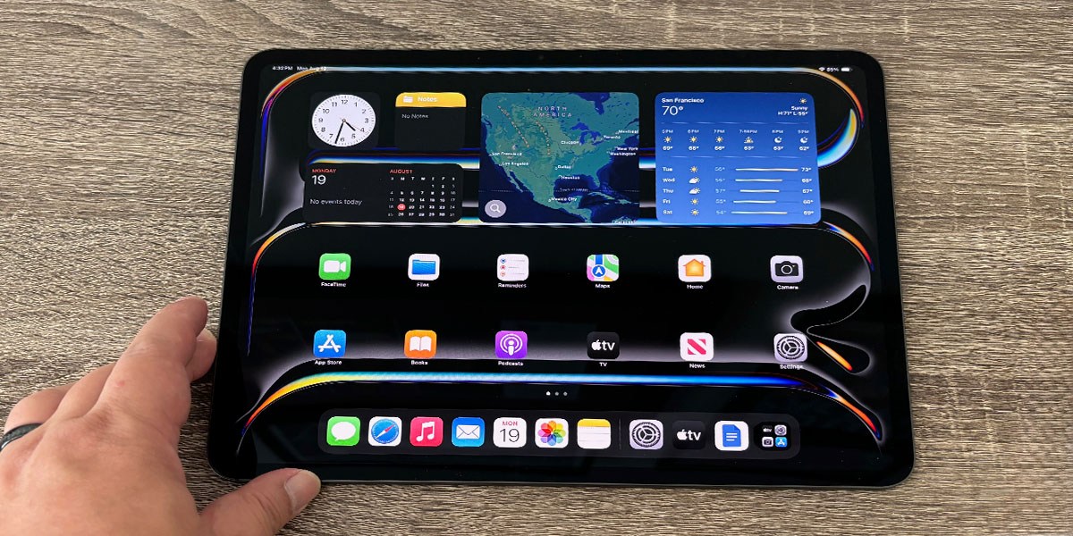 Apple iPad Pro 13-inch (M4) on wooden background