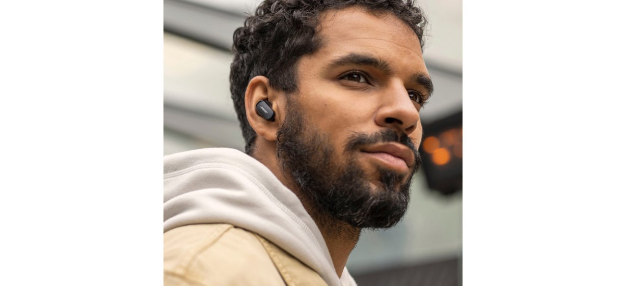 Man wearing Bose QuietComfort Earbuds II True Wireless Noise Cancelling In-Ear Headphones