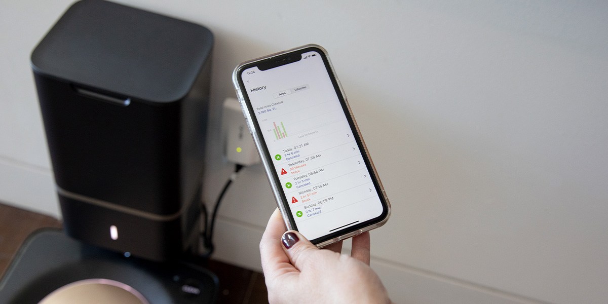 Person using iRobot app