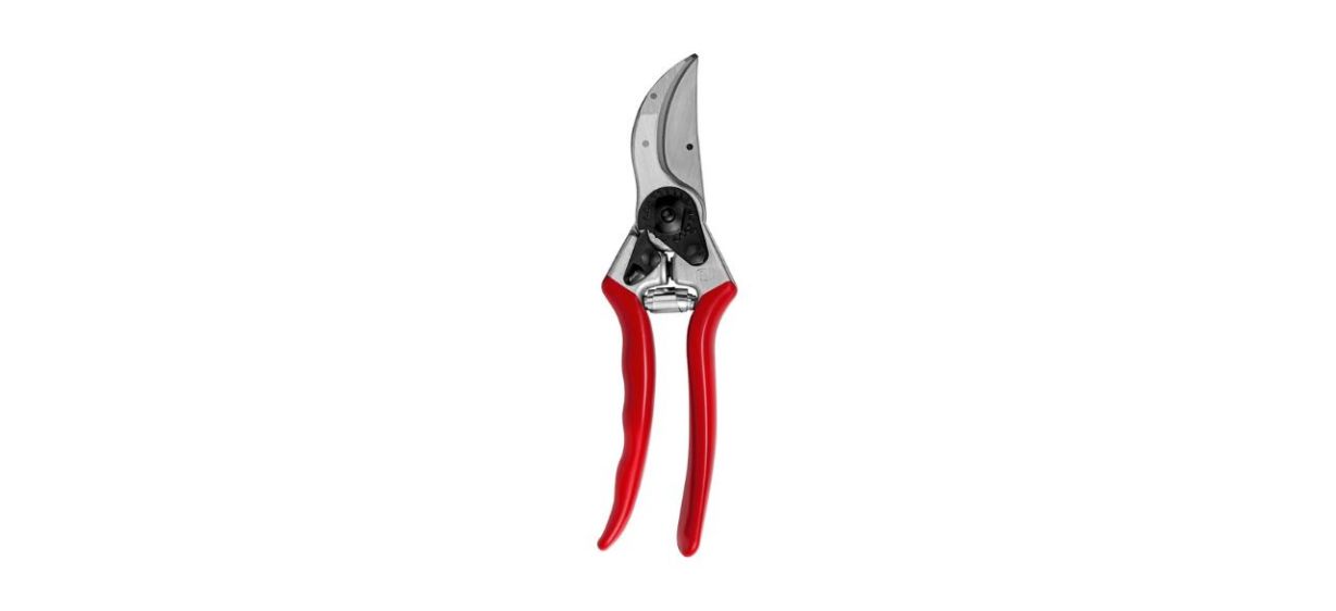 red manual hand pruner on white background