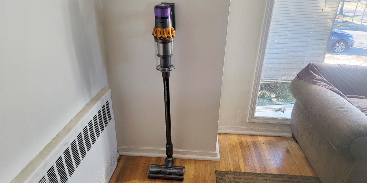 Dyson V15s Detect Submarine leaning against wall